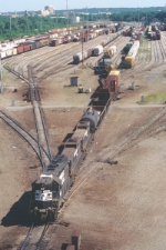 NS 1358 and 2 slugs power a string of cars up the throat 